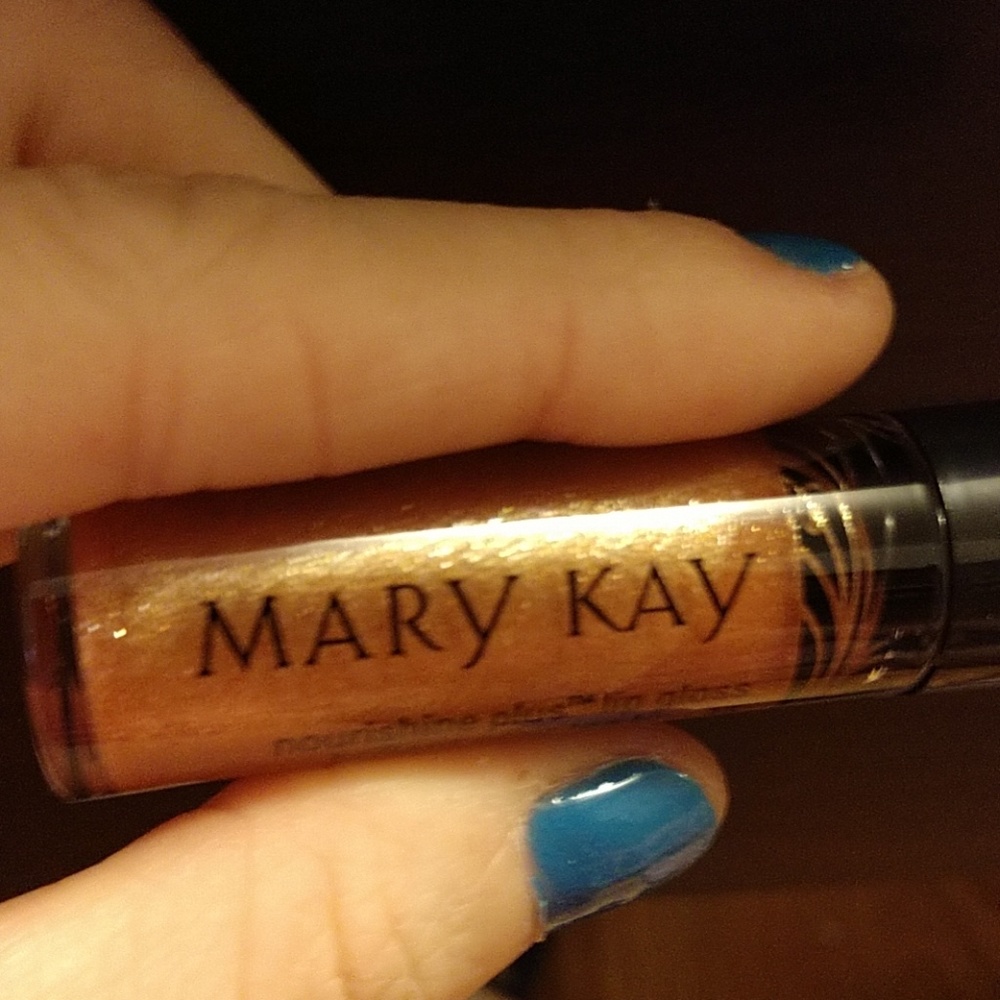 Beach bronze nourishine plus lip gloss